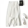 Presentazione piatta di eleganti pantaloni a gamba larga in cotone e lino bianco - Taglia S / Pantaloni e gonne / Bianco