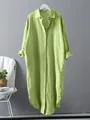 Detailed view of loose light green cotton linen long shirt dress hanging on wall - Light Green