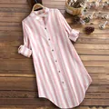 Detailed view of women's pink and white vertical striped long sleeve tunic shirt - S / Tops / Pink