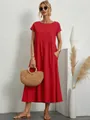 Dettaglio dell'abito rosso a maniche corte in cotone e lino con tasche laterali - Rosso