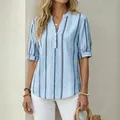 Elegant light blue vertical striped blouse featuring v-neck design and delicate embroidery - S / Tops / Sky Blue