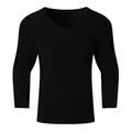 Detailed view of the waffle knit texture on a black men's V-neck long sleeve sweater - S / Tops / Black