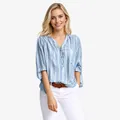 Detailed view of women's loose striped shirt with V-neck and vertical patterns - XS / Tops / Light Blue
