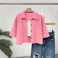 Women's stylish pink textured button-down shirt with pocket and short sleeves - S / Tops / Pink