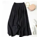 Pantalón culotte de lino y algodón negro de talle alto con ajuste relajado y drapeado - M / Bottoms / Negro