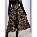 Elegant high-waisted leopard print midi skirt with ruffled hem and a flared silhouette - S / Bottoms / Leopard Print