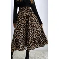 Stylish leopard print high-waisted maxi skirt with tiered hem design for a trendy boho look - S / Bottoms / Leopard Print