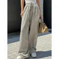 Pantaloni casual da donna a righe verticali a vita alta e gamba larga dallo stile moderno - Taglia S / Pantaloni e gonne / Nero