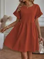 Close-up of rust-colored cotton-linen dress with ruffle sleeves and gathered waist - S / Top And Bottom / Rust Red