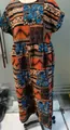 Detailansicht eines lockeren Maxikleides aus Baumwoll-Leinen mit buntem Boho-Print. - S / Oberteil Und Unterteil / Schwarz Kariert