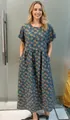 Vorderansicht eines vintage geblümten Baumwoll-Leinenkleides mit praktischen Taschen - S / Unterteile / Grünes kleines Blumenmuster