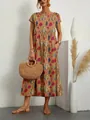 Boho-Maxikleid aus Baumwolle und Leinen mit botanischem Print und Seitentaschen - S / Oberteile / Erdgelb
