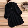 Vue détaillée d'une chemise noire en lin vintage avec boutons et un ourlet superposé élégant. - M / Hauts / Noir