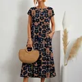 Loses Midikleid aus Baumwollleinen mit dunkelblauem Blumenmuster und Seitentaschen - S / Oberteil Und Unterteil / Marineblau Floral