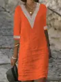 Detail view of orange V-neck dress with intricate lace trim and medium sleeves - S / Orange Red