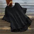 Detalle de la blusa negra de algodón y lino con elegantes volantes en mangas y dobladillo - S / Tops / Negro