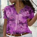 Macro view of women's vibrant purple floral print short sleeve slim fit lapel shirt - S / Tops / Purple