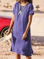 Purple textured casual midi dress with side slits shown in a desert lifestyle setting - Purple