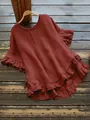 Vue détaillée de la blouse bordeaux avec ourlet et manches à volants élégants - S / Hauts / Bordeaux