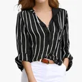Casual women's long sleeve V-neck blouse featuring black and white vertical stripes - S / Tops / Black