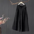 Detailopname van zwarte katoen-linnen culottes met hoge taille en wijde pijpen. - M / Bottoms / Zwart