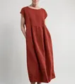 Detail of loose sleeveless cotton linen dress in rust red with side pockets. - S / Top And Bottom / Rust Red