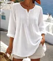 Vista dettagliata della camicetta bianca larga in cotone e lino con pieghe e scollo Henley - 3XL / Top / Bianco