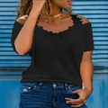 Detail of the elegant lace V-neckline and cold-shoulder design on a black T-shirt - S / Tops / Black