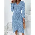 Blue floral v-neck wrap dress with ruffle puff sleeves and irregular hem detail - S / Blue
