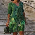 Detailed view of women's vintage floral print V-neck midi dress with half sleeves in dark green - 3XL / Top And Bottom / Dark Green