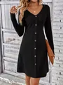 Close-up of elegant black ribbed long-sleeved dress with front button detailing - S / Top And Bottom / Black