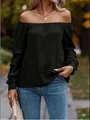 Elegant detail of a woman wearing a black off-the-shoulder boat neck long sleeve blouse - S / Tops / Black
