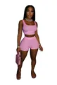 Close-up full body model display of the pink crop top and tight mini shorts set - M / Top And Bottom / Pink