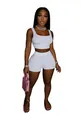 Detail of white two-piece sports set for women with crop top and high waist shorts - S / Top And Bottom / White