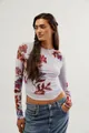 Detail view of sheer mesh double-layer long sleeve T-shirt with floral pattern - S / Tops / Light Blue