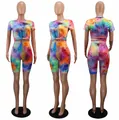 Front, side, and back views of vibrant tie-dye shorts and t-shirt two piece set - S / Top And Bottom / Multi Orange