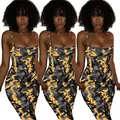 Detailed view of the vibrant yellow camouflage pattern on a sexy bodycon slip dress. - S / Top And Bottom / Turmeric