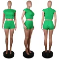 Multi-angle views of a green bubble textured crop top and shorts set on mannequins - S / Top And Bottom / Green