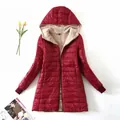 Detail of red hooded quilted jacket with warm sherpa lining - S / Tops / Red