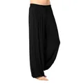Detail showing the loose fit and drape of men's black yoga harem pants. - S / Bottoms / Black