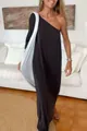 Full-length view of a black one-shoulder loose-fitting knit dress on a female model - S / Bottoms / Black