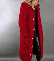 Detailed view of women's oversized long red hooded cardigan with chunky cable knit texture - S / Red