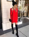 Chic red long-sleeved knit sweater dress styled with black boots in an urban street setting - S / Tops / Red
