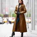 Classic brown long leather trench coat for women featuring a slim fit button closure - S / Tops / Brown