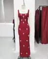Full view of a burgundy sleeveless bandage dress with sparkling crystal flower accents. - S / Top And Bottom / Burgundy