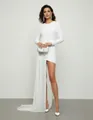 Elegant white long-sleeved evening dress with asymmetrical sheer train and diamond floral detail. - S / Tops / White