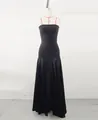 Detailed view of an elegant black evening gown with mesh patchwork on a dress form - XS / Top And Bottom / Black