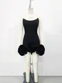 Front view of black bandage mini dress featuring three large ruffled 3D flower appliques. - S / Black