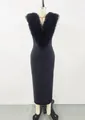Elegant black long bandage dress with ruffle mesh V-neckline on mannequin. - Black