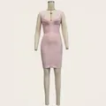 Detailed view of pink V-neck sleeveless bandage party dress on mannequin stand - S / Pink